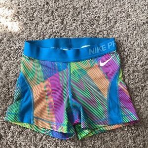 Multi colored Nike pro shorts